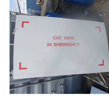 Cut here in emergency sign